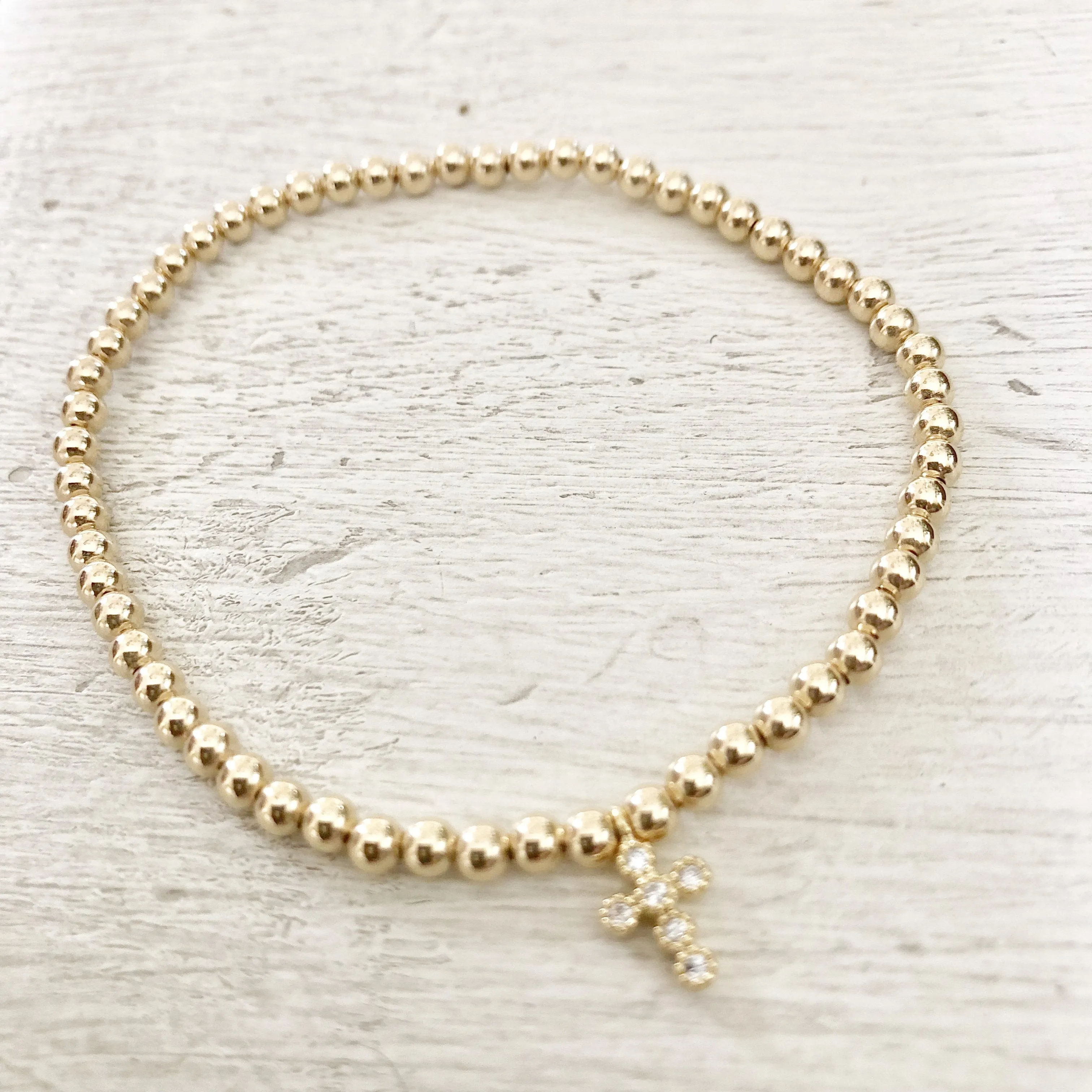 3mm Bead Stretch Bracelet with Matching Cubic Zirconia Cross Charm