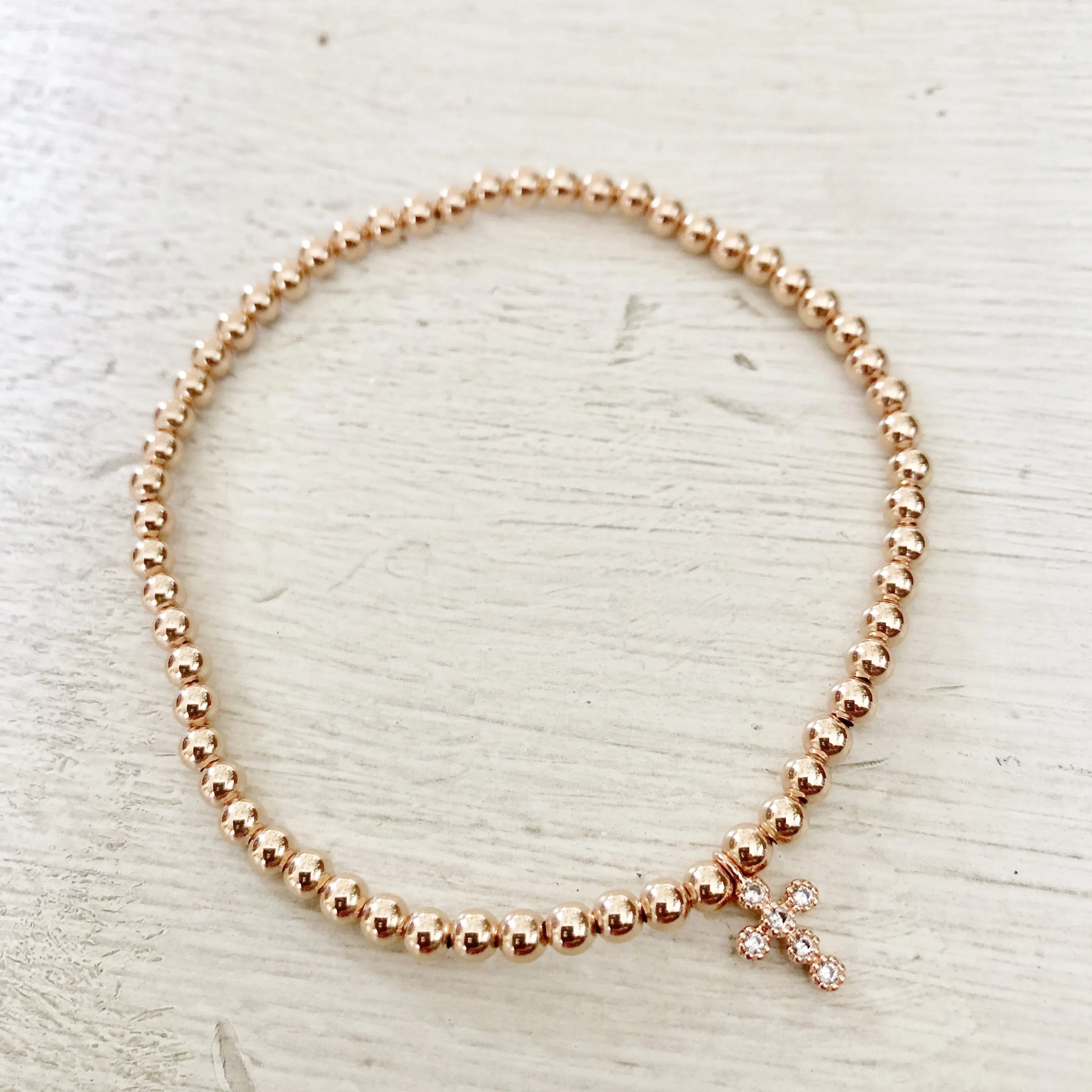 3mm Bead Stretch Bracelet with Matching Cubic Zirconia Cross Charm
