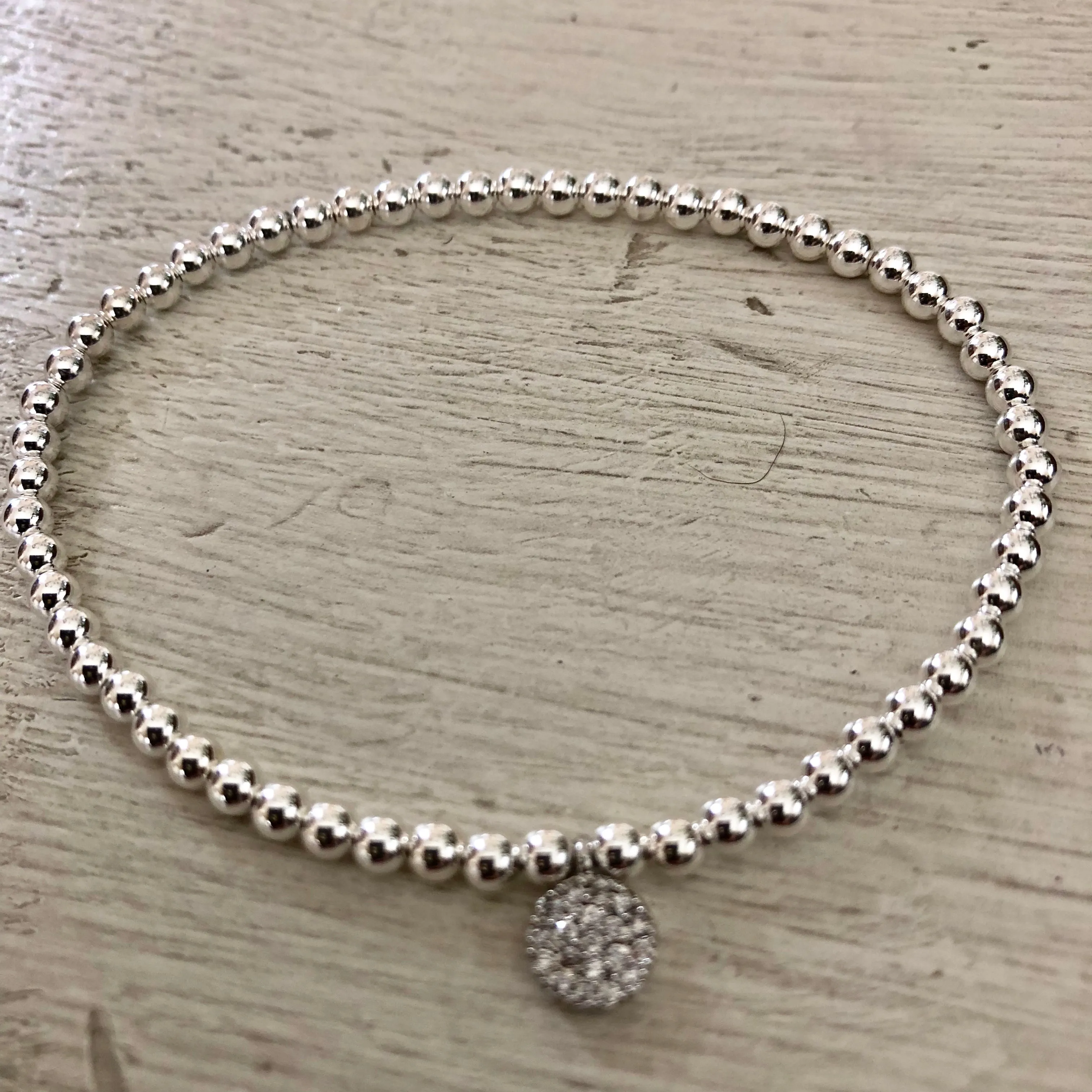 4mm Bead Stretch Bracelet with Matching Cubic Zirconia Round Disc Charm