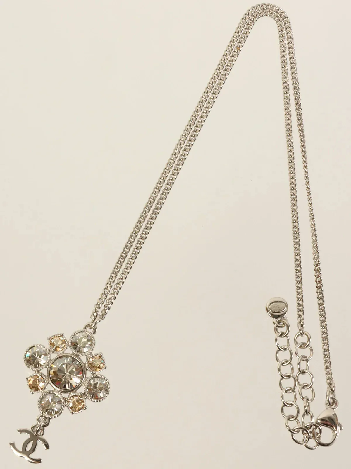 CHANEL 2012 Made Rhinestone Diamond Motif Cc Mark Swing Necklace Silver/Champagne