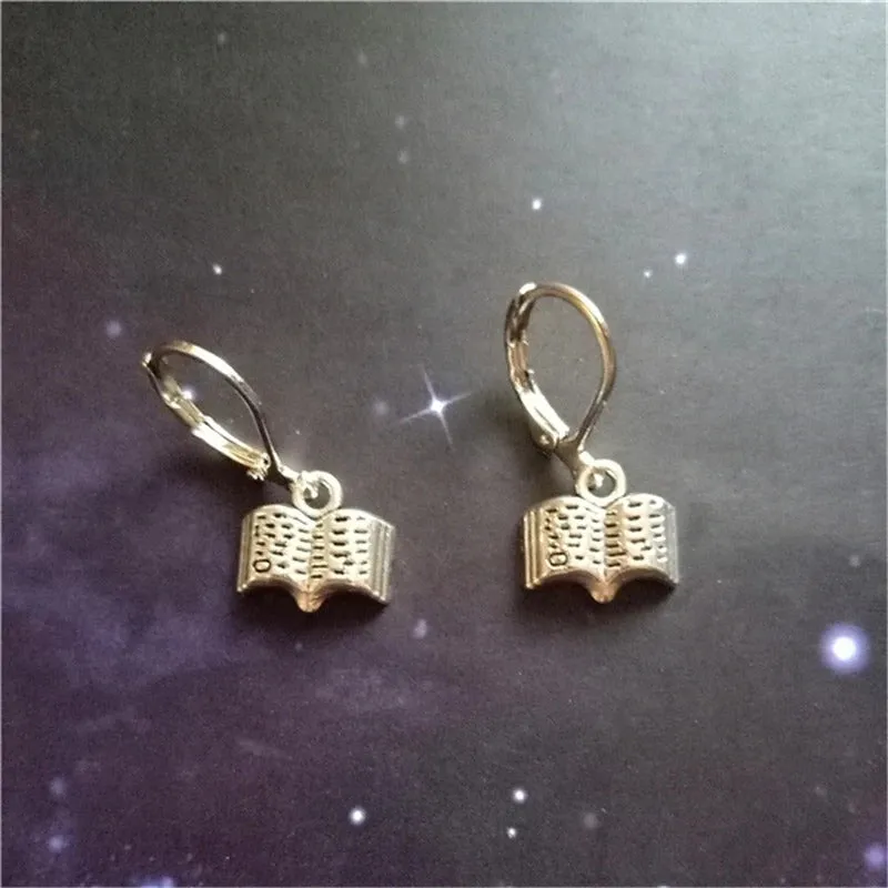 Earring with dangling books